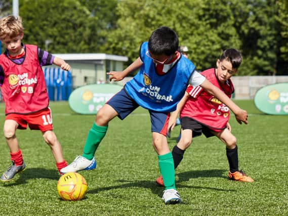 Children can access free football sessions in Northampton in June.
