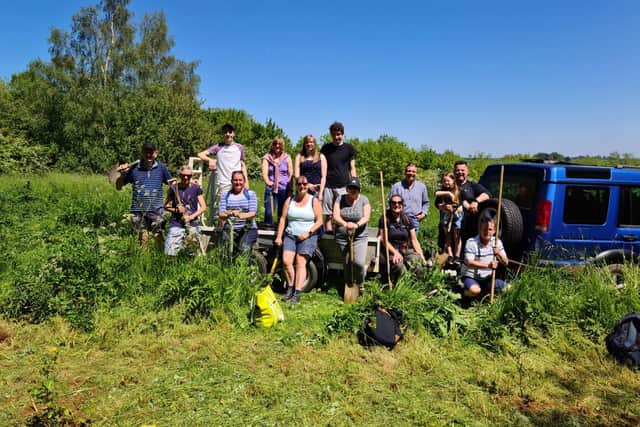 A team of volunteers helped to plant 100 trees at Brixworth Country Park.