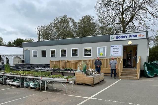 Brothers Jonathan and Julian Chalmers, who have kept Hobby Fish going in temporary buildings after the fire in May last year.
