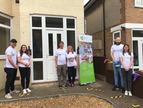 Phil and Sue Adkins (centre), their son, Rob and partner Shannon (left), daughter Emma with partner Andrew (right). Photo: Northamptonshire Health Charity.