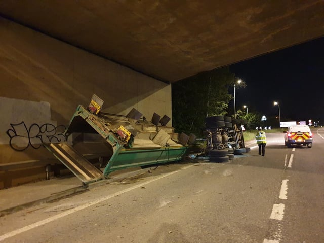 A lorry overturned after hitting Wooldale Road Bridge in the early hours of this morning.