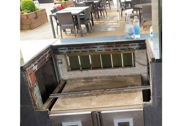 This is the empty space left at the Brampton Halt's outdoor kitchen after thieves stole the entire station overnight.