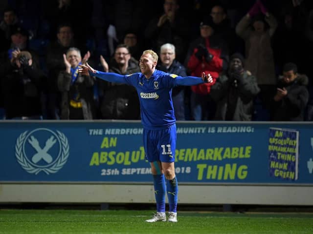 Mitch Pinnock celebrates a goal during his AFC Wimbledon days. Picture: Getty.