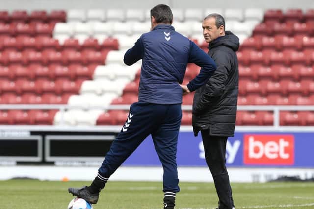 Colin Calderwood, pictured working for Blackpool, and Ian Sampson are now on the same team.