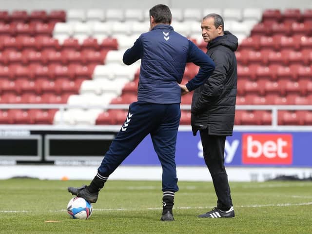 Colin Calderwood, pictured working for Blackpool, and Ian Sampson are now on the same team.