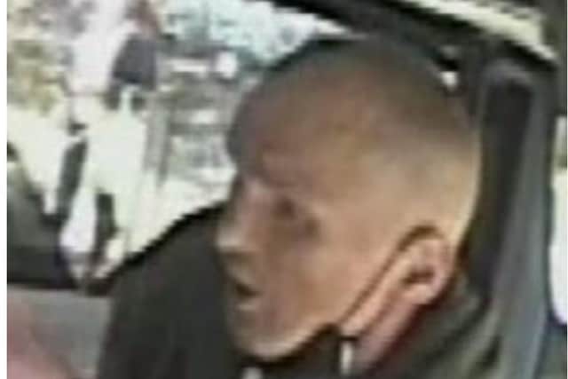 Police want to speak to this man in connection with the racial abuse.