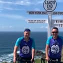 Ian Corkram and Jeff King at Lands End having cycled from Milton Keynes for Great Ormond Street Hospital