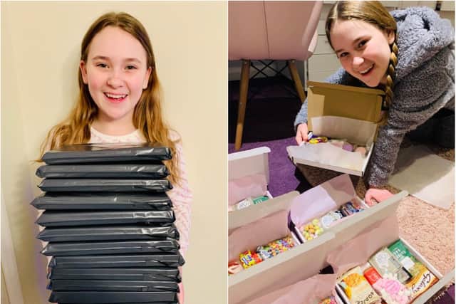 Evie Kendall with the treat boxes she has been making during the pandemic.