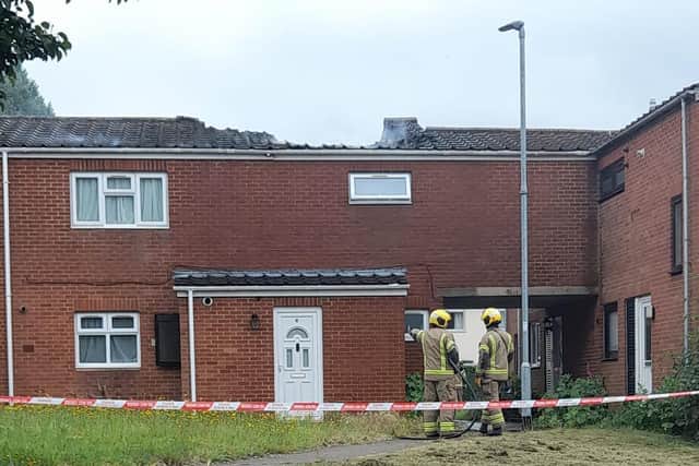 The roof of the property was aflame when firefighters arrived at Badby Close yesterday. Photo: Samantha Wooldridge