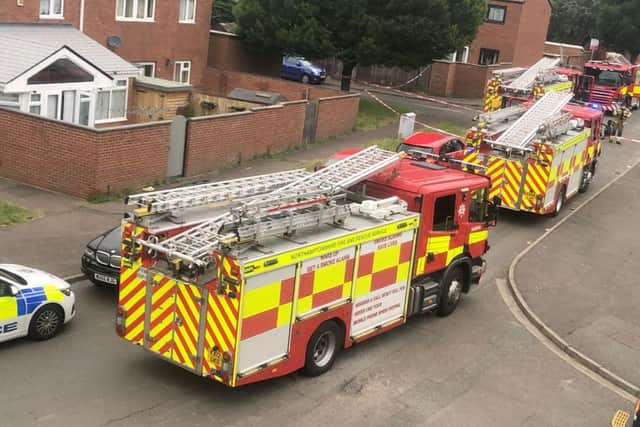Fire crews rushed to the scene of the house fire at Badby Close yesterday. Photo: Jake Venner