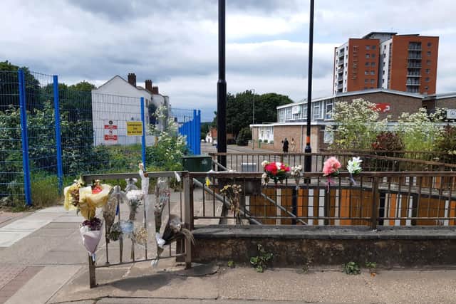Flowers were left at the scene of the incident.