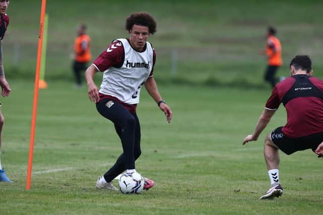 Shaun McWilliams trains with new signings Mitch Pinnock and Jordan Flores. Pictures: Pete Norton.