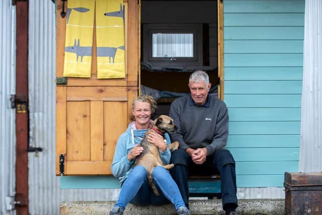Elliotts' Rectory Farm's Sarah Elliott-Hart, her dad, Gary Elliott, and Merryn the dog. Photo: Kirsty Edmonds.