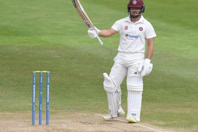 Ricardo Vasconcelos celebrates reaching his half-century in Northants' first innings total of 170 for nine