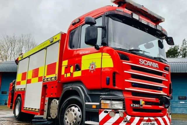 Firefighters used specialist equipment to help secure a car driven into the Grand Union Canal