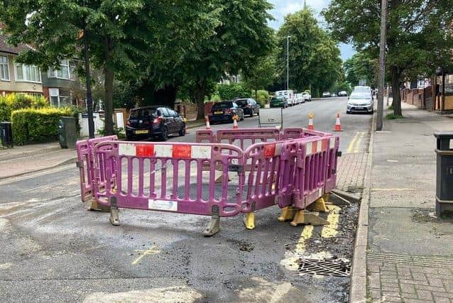 Water is seeping from the surface on Kettering Road