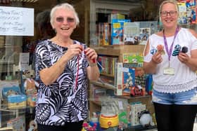 Margaret Wride (left) with manager of Age UK charity shop in Rothwell, Natasha McAlindon (right).