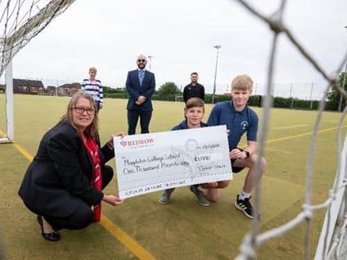 Astro-turf at Magdalen College School, Brackley will be improved thanks to the housebuilder donation.