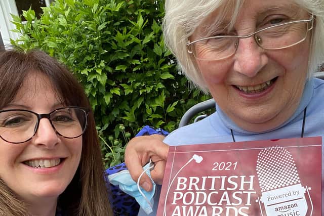 Penny Bell with her mum Rosemary and their podcast award.