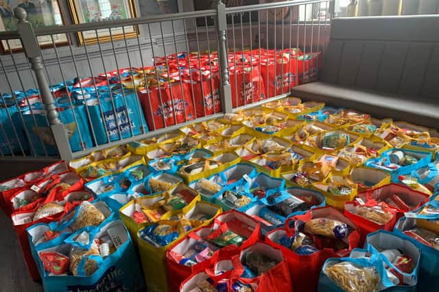 Volunteers packed around 250 bags for families across Northamptonshire.