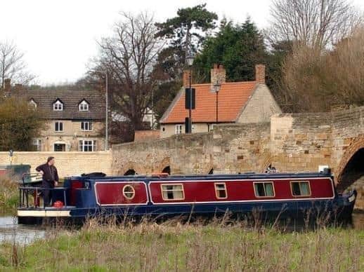 The bridge crosses the River Nene