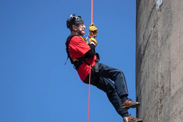 The 90-year-old was ready for a pint as he descended. Photo: Kirsty Edmonds.