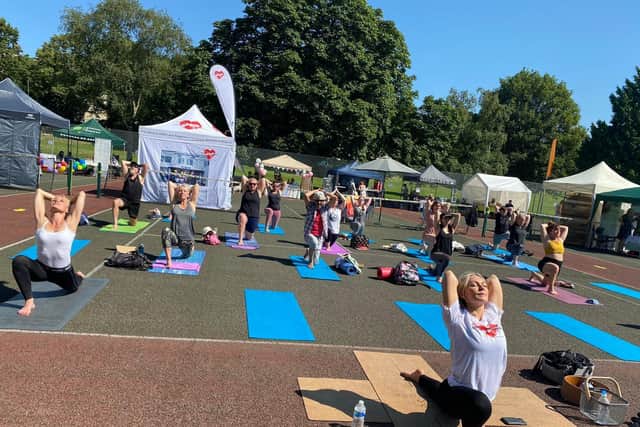 Kristina Rihanoff leading a Soo Yoga session at the Family Wellbeing Fair.