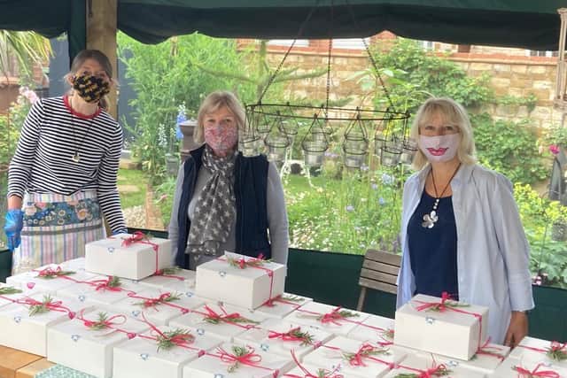 A group of friends has raised £3,000 for three charities by making and delivering afternoon tea boxes.