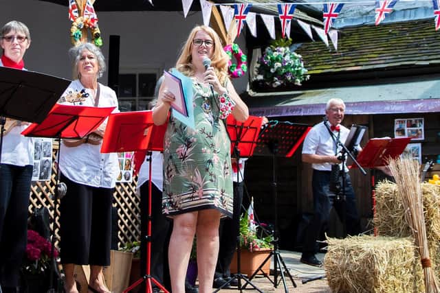 Daventry mayor Karen Tweedale with the band at Ruby Humphrey's 100th birthday party at Wheatsheaf Court Care Home in Sheaf Street, Daventry, on Monday, July 26. Photo: Kirsty Edmonds