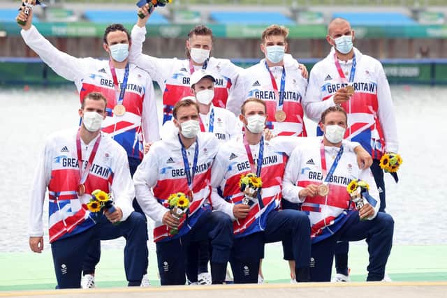 James Rudkin (front row, second from right) and his rowing team won a bronze medal.