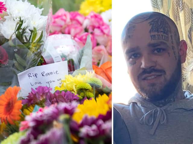 Flowers and tributes to Robbie Fitzpatrick have been left at the roadside