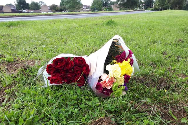 Flowers left at the scene.