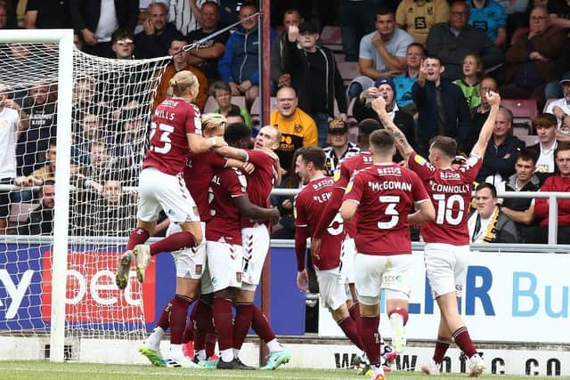 Benny Ashley-Seal celebrates scoring Cobblers' first goal of the season. Picture: Pete Norton.