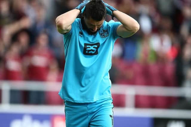Lucas Covolan has his head in his hands after being sent off. Picture: Pete Norton.