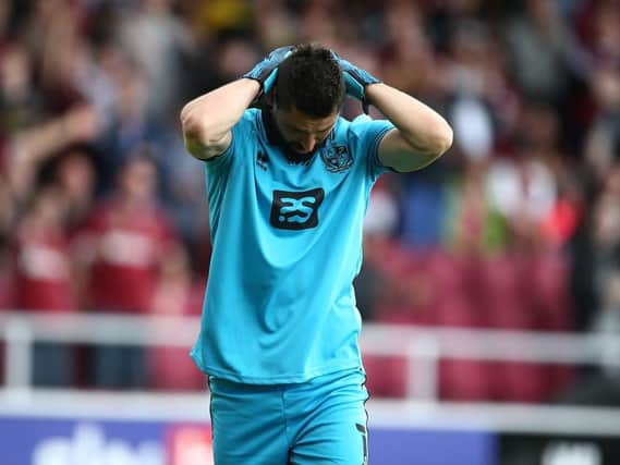 Lucas Covolan has his head in his hands after being sent off. Picture: Pete Norton.
