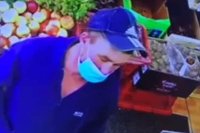 Police investigating fraudulent use of a bank card want to identify this man