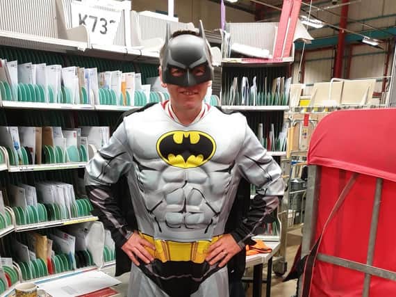 Kislingbury postman Jonathan Dolling raised lots of money for charity during the coronavirus lockdowns by dressing up in different costumes, including Batman