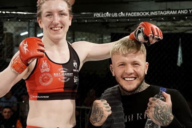 Hayley Valentine and fellow MMA fighter and cornerman Jordan Vucenic after Saturday's win.