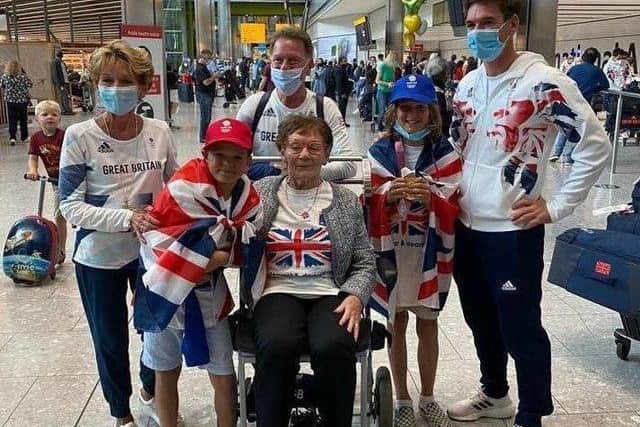 Dylan returns to Heathrow greeted by his family Desborough-based parents Jane and Graham, and his nan Hannah Scott.