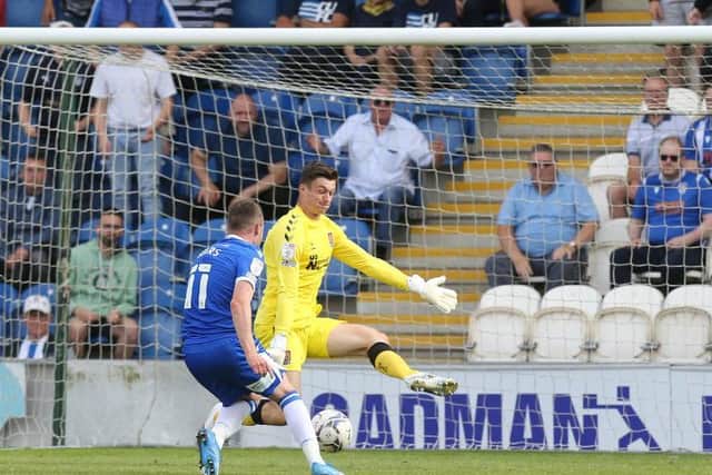 No way through: Liam Roberts refused to be beaten on Saturday, thwarting Freddie Sears on this occasion. Picture: Pete Norton.
