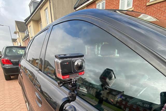 The camera attached to Debe's car