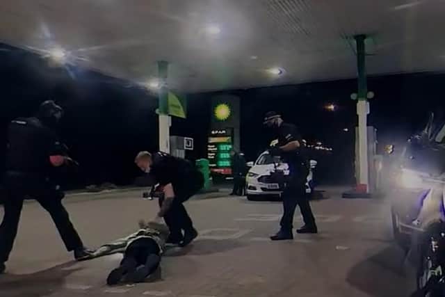 Northamptonshire Police said they were called by concerned members of the pubic who had reported seeing a firearm in the car with the driver's hands chained to the steering wheel.
