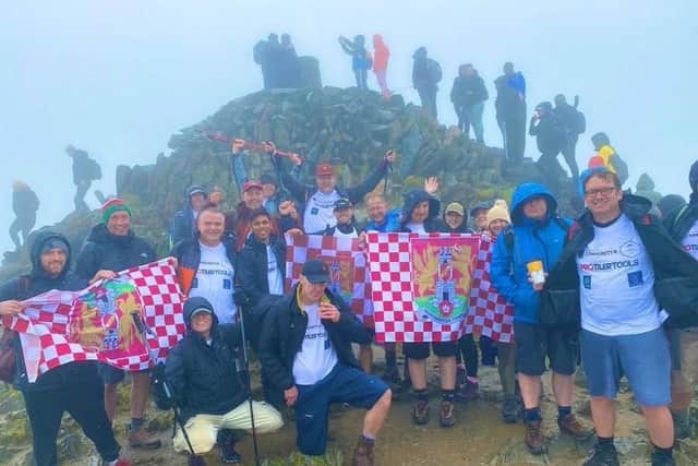 The team climbed Mount Snowdon last weekend.