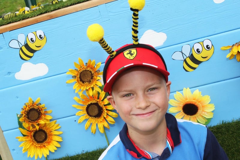 Nine-year-old Oscar Evans with his bee antennae