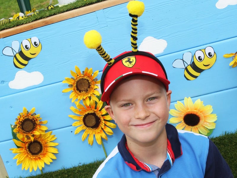 Nine-year-old Oscar Evans with his bee antennae