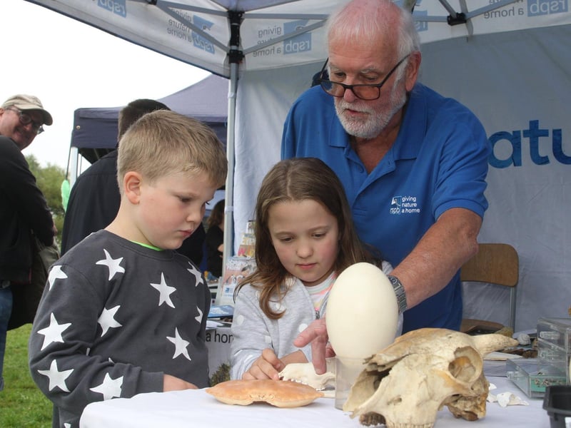The RSPB's Allan Smedley with Betsy Hatfield, ten, and brother Tom, six