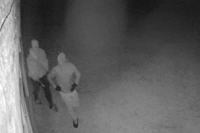 Police have issued this image in the hope that someone might recognise the two men