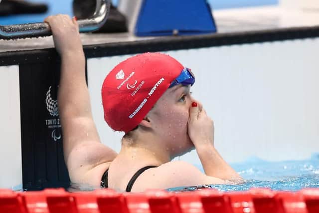 Maisie Summers-Newton realises she has just struck gold, and broke the world record, in Tokyo
