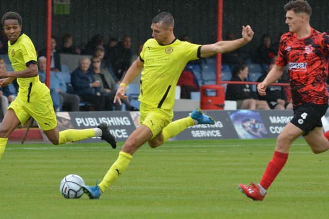 Matt Lowe fires home Brackley's goal in their 1-0 success at Alfreton