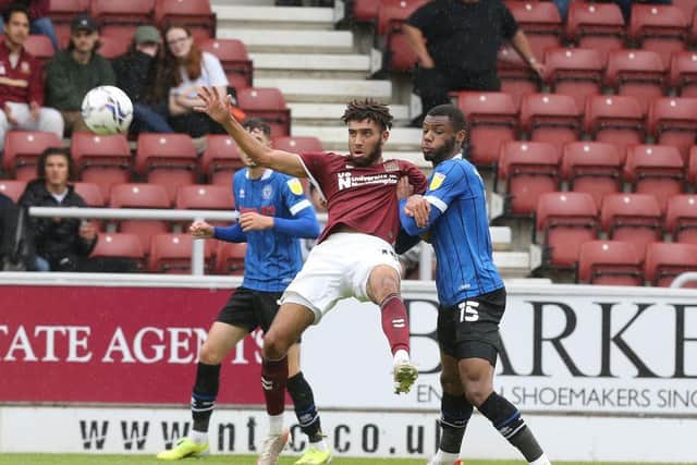 Kion Etete was wrestled the floor on several occasions against both Rochdale and Wimbledon.
